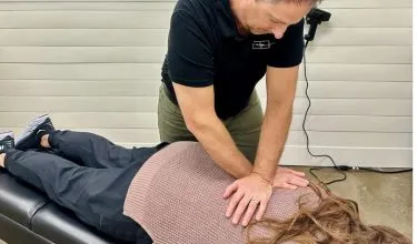 adjustment Chiropractic adjustment of female patient.